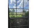 Bright window with a picturesque view of the outdoor landscape and blue skies at 419 Courtland Dr, Summerville, SC 29486