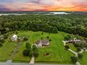 Expansive property featuring a custom home and lush landscaping at 727 Sonny Boy Ln, Johns Island, SC 29455