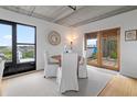 Charming dining area with seating for four, with sliding doors and a view of the exterior at 1 Cool Blow St # 153, Charleston, SC 29403