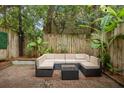 Cozy outdoor patio features a comfortable sofa set, perfect for relaxing and entertaining at 11 America St, Charleston, SC 29403