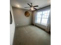 Cozy bedroom with carpet, ceiling fan, and decorative wall art; perfect for relaxation and comfort at 118 Magnolia House Dr, Summerville, SC 29486