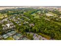 Stunning aerial view of the community surrounded by lush green landscape and golf course at 205 Delahow St, Daniel Island, SC 29492