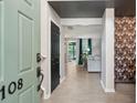 Inviting foyer showcases the home's open floor plan and stylish decor at 108 Plume Poppy Ln, Ladson, SC 29456