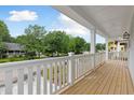 Inviting outdoor porch, perfect for relaxing and enjoying the surrounding scenery at 1655 Cultivation Ln, Mount Pleasant, SC 29466