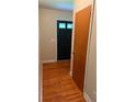Entryway featuring a hardwood floor, closet, and door with glass panes at 2734 Mona Ave, Charleston, SC 29414