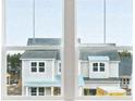 Clean home exterior view, as seen through a window at 88 French Garden Cir, Summerville, SC 29486