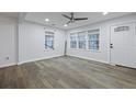 Bright room with beautiful wood floors, a ceiling fan, and tons of natural light at 1105 Crull Dr, Charleston, SC 29407