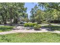 Relaxing community green space featuring mature trees, benches, and well-maintained landscaping at 1120 Hidden Cove Dr # I, Mount Pleasant, SC 29464