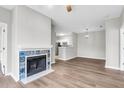 Cozy living room features a fireplace with a tile surround and wood floors at 1600 Long Grove Dr # 423, Mount Pleasant, SC 29464