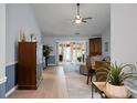 Bright, spacious living room with neutral paint, light-colored floors, and patio access at 2438 Hansard Dr, North Charleston, SC 29406