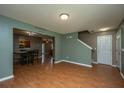 Spacious living room featuring laminate wood flooring, neutral paint, and an open design at 311 Aberdeen Cir, Summerville, SC 29483