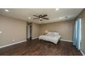 Spacious main bedroom features modern ceiling fan and laminate flooring, with room to relax at 311 Aberdeen Cir, Summerville, SC 29483