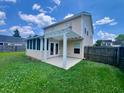 View of the screened-in porch and covered patio, both perfect for outdoor entertaining at 412 Beverly Dr, Summerville, SC 29485