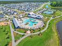 Stunning aerial view of community amenities, including a resort-style pool and clubhouse at 501 Rhythm St, Summerville, SC 29486
