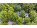 An aerial view of a lush, tree-covered neighborhood, showcasing the property's serene setting and proximity to nature at 5152 Coral Reef Dr, Johns Island, SC 29455