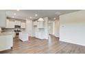 Open-concept kitchen with modern appliances and wood flooring at 547 Verdi Drive Dr, Summerville, SC 29486