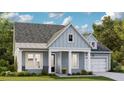 Charming single-Gathering home featuring light blue siding, white trim, and a well-manicured front yard at 87 French Garden Cir, Summerville, SC 29486