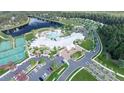 Stunning aerial view of the community amenity center, pool, and tennis courts at 1012 Sagegrass St, Summerville, SC 29485