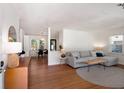 Bright living room with hardwood floors, modern furniture, and an open layout at 1417 Downing St, Charleston, SC 29407