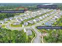 Aerial view of neighborhood showcasing community layout, amenities, and street access at 1973 Parish House Cir, Johns Island, SC 29455