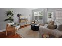 Bright living room with a plush rug and neutral decor at 2064 Promenade Ct, Mount Pleasant, SC 29466
