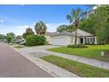 Lovely single-Gathering home with a lush green lawn and attached two-car garage at 3486 Ashwycke St, Mount Pleasant, SC 29466