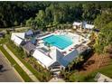 Aerial view of community pool and amenity center surrounded by well-manicured lawns at 3901 Summerton St, Mount Pleasant, SC 29466