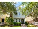 Charming home featuring lush landscaping and a welcoming entryway at 417 Verbena Ave, Summerville, SC 29483
