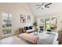 Light filled living room with large windows, plush seating, and contemporary decor at 1478 Diamond Blvd, Mount Pleasant, SC 29466