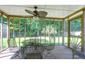Screened patio with outdoor seating and ceiling fan at 169 Historic Dr, Mount Pleasant, SC 29464