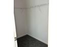 Empty closet with metal shelving and neutral carpeting provides storage solutions at 18441 Round O Rd, Round O, SC 29474
