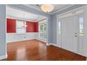 Beautiful entryway with hardwood floors and an adjacent dining room at 213 Crossandra Ave, Summerville, SC 29483