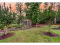 Lush backyard featuring a fenced garden at 242 Cheyenne Rd, Summerville, SC 29483