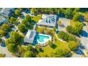 Resort-style community clubhouse, pool, and lounge areas surrounded by lush greenery at 246 Slipper Shell Ct, Mount Pleasant, SC 29464