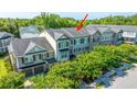 Charming townhouse with attached garage, neutral colors, and well-maintained landscaping at 246 Slipper Shell Ct, Mount Pleasant, SC 29464