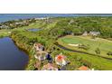Stunning aerial view of a charming home, golf course, and scenic surroundings with ocean view at 930 Sealoft Villa Dr, Seabrook Island, SC 29455