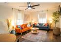Bright living room featuring hardwood floors, comfortable seating, and stylish decor creating a welcoming atmosphere at 1137 Dickson Ave, Hanahan, SC 29410