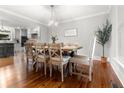 Bright dining room with hardwood floors and views to backyard at 1211 Dennis Blvd, Moncks Corner, SC 29461