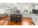 Spacious kitchen with modern appliances, large island with seating, and hardwood floors at 1211 Dennis Blvd, Moncks Corner, SC 29461