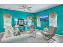 Comfortable living room with hardwood flooring, decorative touches, and lots of natural light at 146 Chaste Tree Cir, Goose Creek, SC 29445