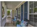 Cozy front porch featuring blue accents and comfortable seating at 1616 Dotterers Run, Charleston, SC 29414