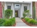 Pathway to the condo entrance with lush greenery and brick accents, leading to units 161-168 at 163 Golfview Ln, Summerville, SC 29485