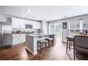 Modern kitchen featuring stainless steel appliances, granite countertops, and a breakfast bar with seating at 266 Ivory Shadow Rd, Summerville, SC 29486