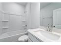 Bright bathroom showcasing a tub and shower combination, plus a single sink at 122 Royal Cainhoy Way, Huger, SC 29450