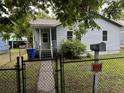 A cozy home is fenced in, with a covered front porch and a 'no trespassing' sign at 2749 E Surrey Dr, North Charleston, SC 29405