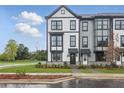 Charming townhome with modern farmhouse design and inviting front porch at 568 Scholar Way, Summerville, SC 29486