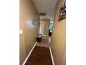 Hallway with hardwood floors, leading to other rooms in the house at 806 Greenmeadow Dr, Goose Creek, SC 29445