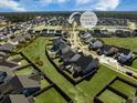 Desirable community with sidewalks for a short walk to the neighborhood park and its water features at 107 Cotton Blossom Way, Summerville, SC 29485