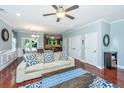 Bright living room with hardwood floors, a ceiling fan, and lots of natural light at 1253 Dingle Rd, Mount Pleasant, SC 29466