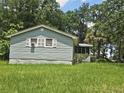 Cozy home featuring a classic design and mature trees on a large lot at 126 Rattlensnake Trl, Walterboro, SC 29488
